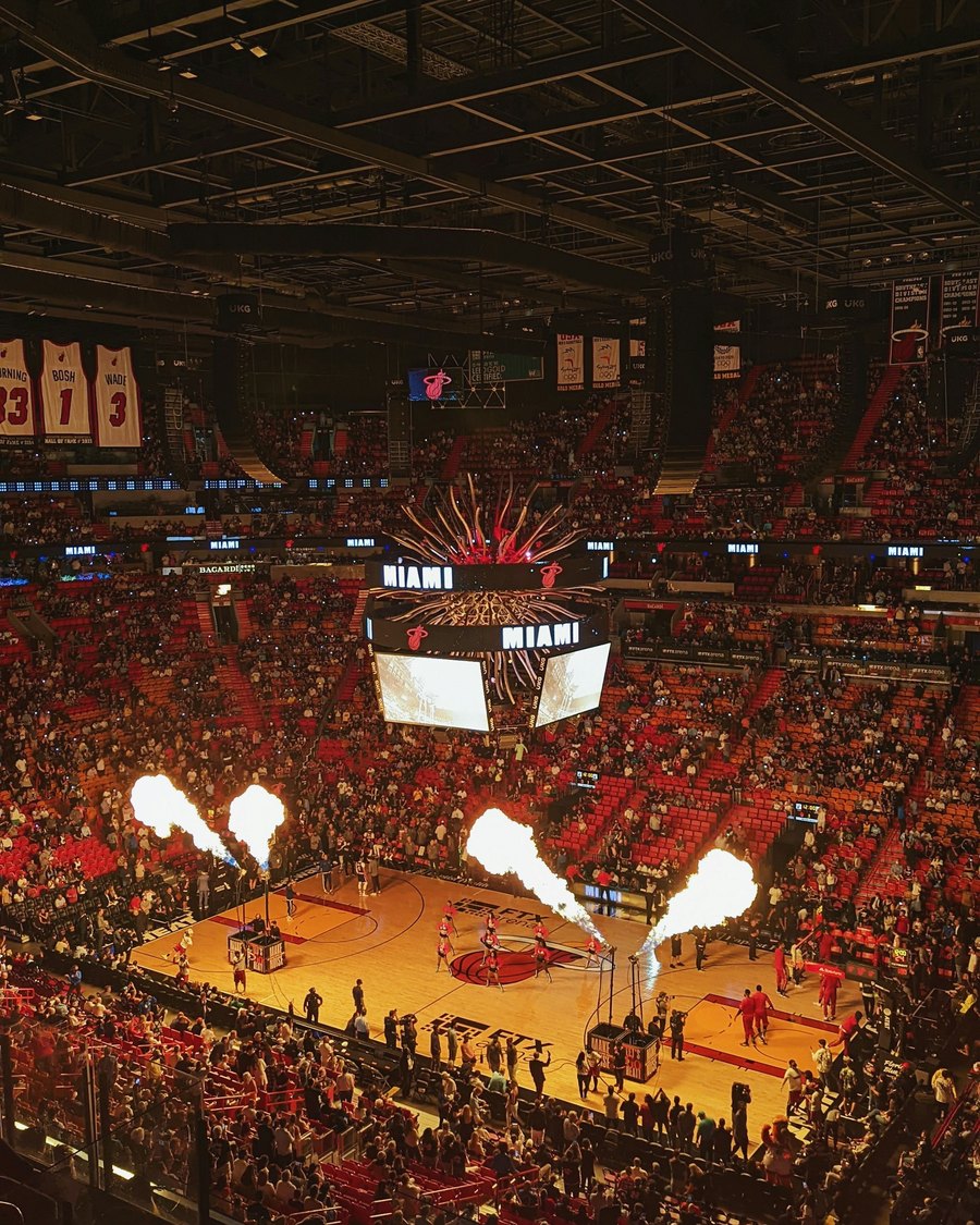 A packed basketball arena at tip-off
